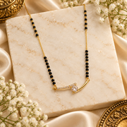 Gold-Tone Curved Pendant Black Beaded Mangalsutra Necklace with Clear Stone