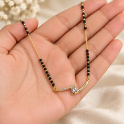 Gold-Tone Curved Pendant Black Beaded Mangalsutra Necklace with Clear Stone