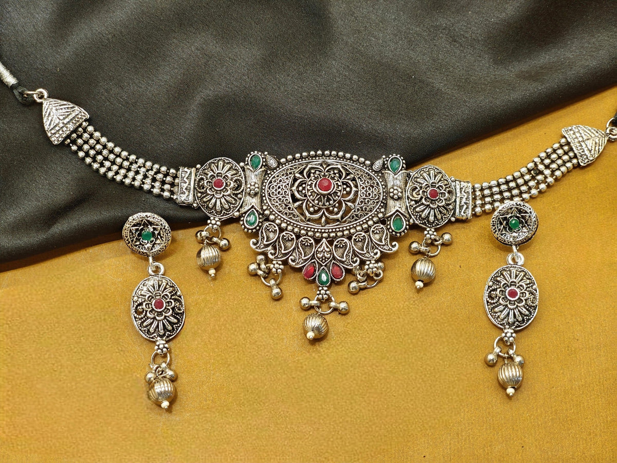 Rajwadi floral oxidised choker set with red green accents and earrings