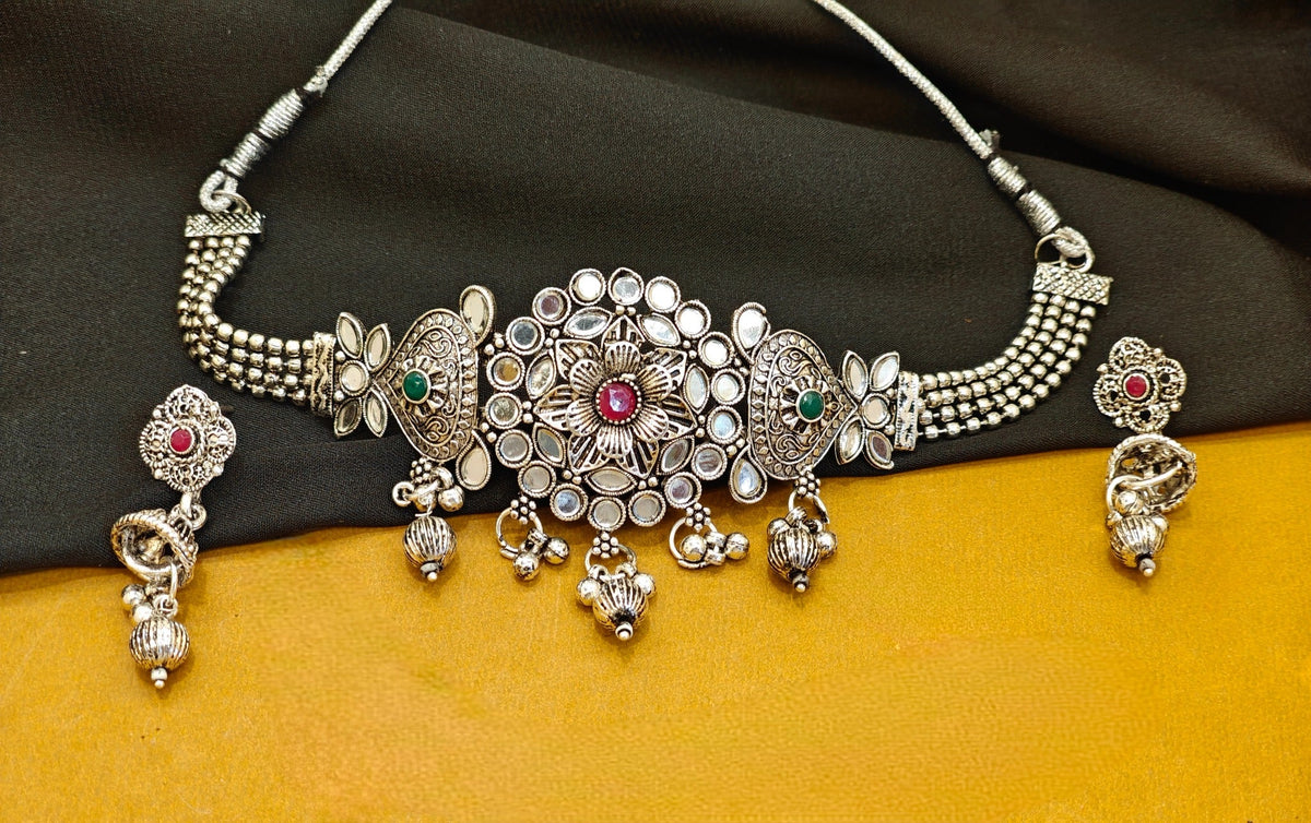 Mirror-work oxidised choker set with floral centre and matching earrings